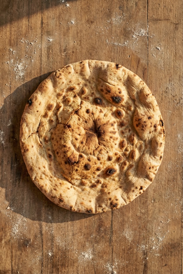 Skoot frame — girl running through frozen scene